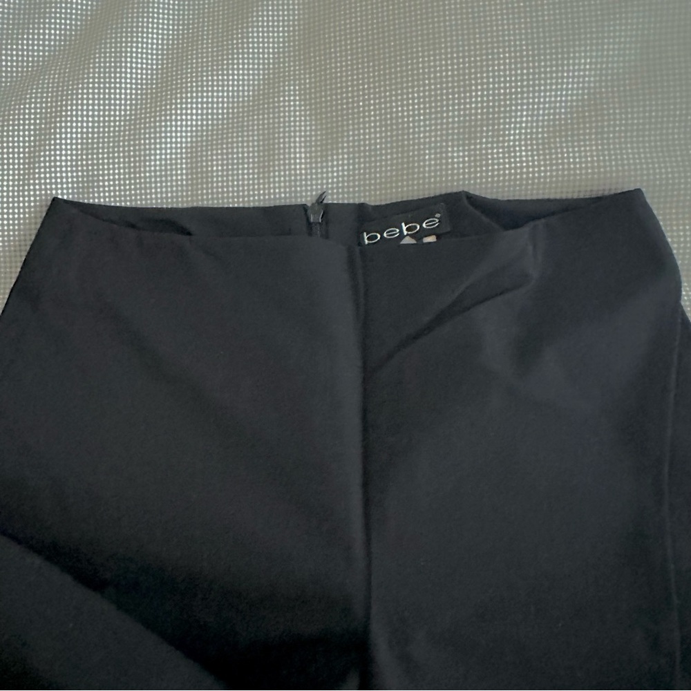 Bebe black straight leg/boot cut pants! Zip up, great condition, size 2